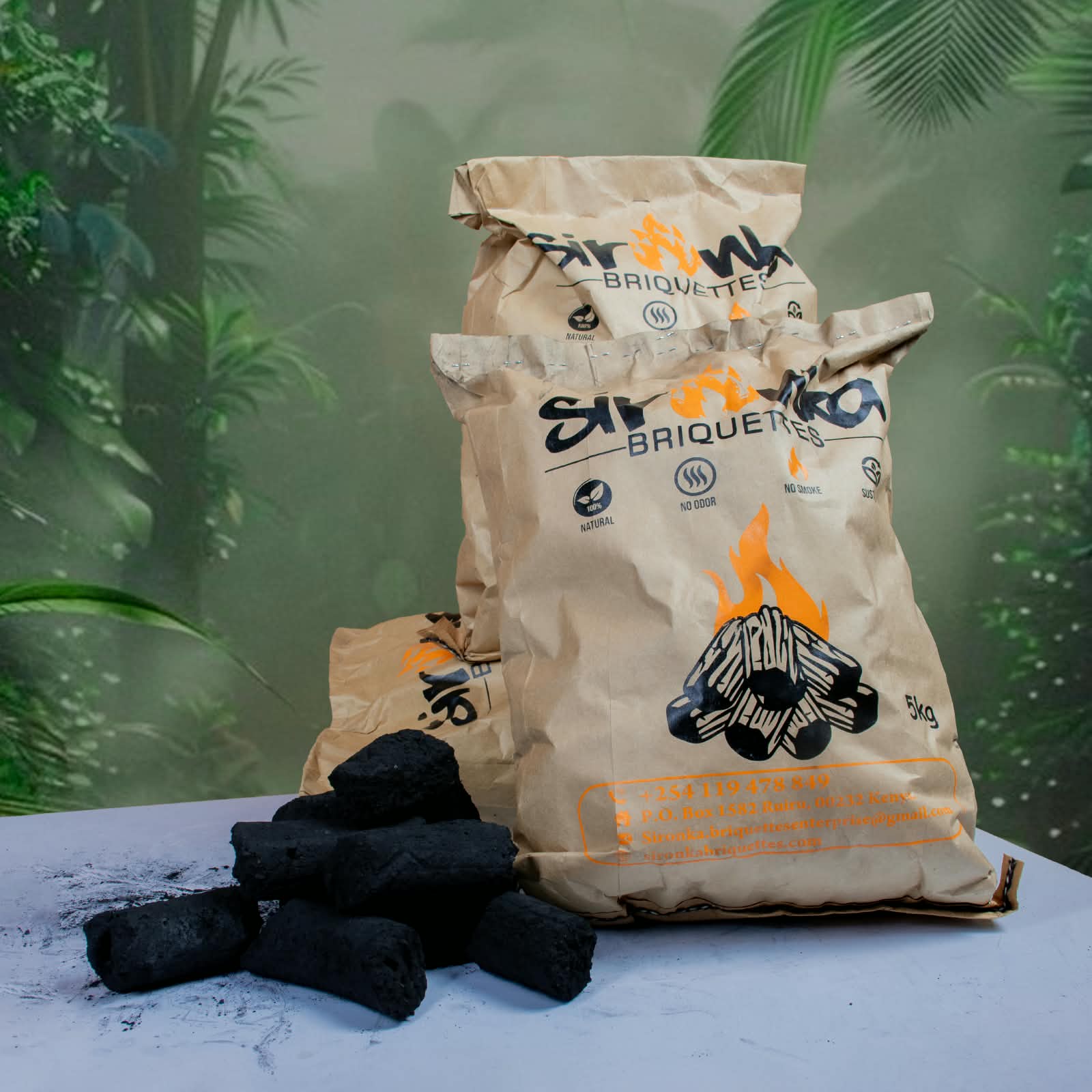 Sironka Briquettes bags beside a pile of black briquettes